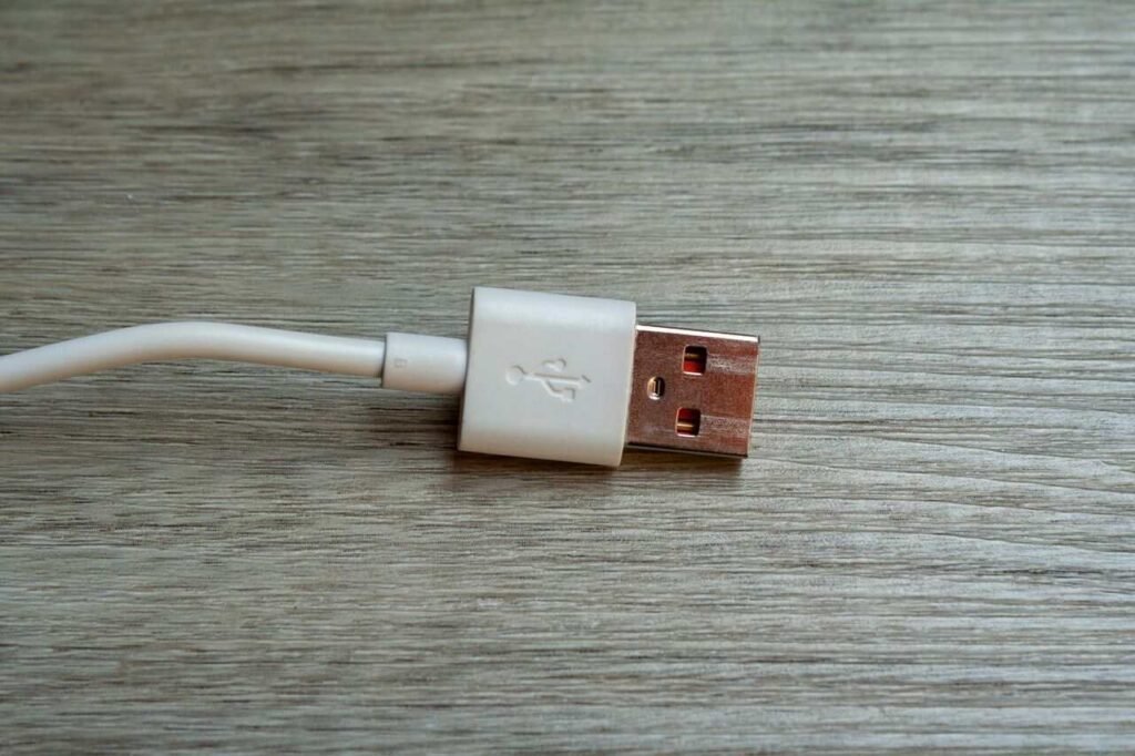 Damaged laptop charger cable causing charging issues