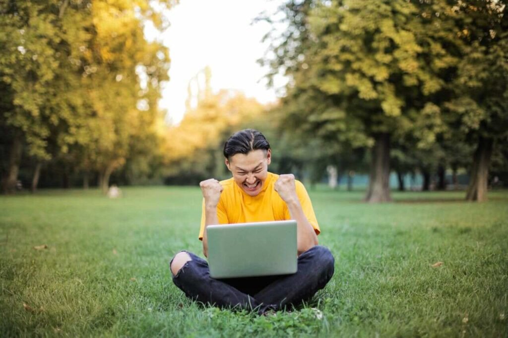 Student achieving success using the best AI laptops for students
