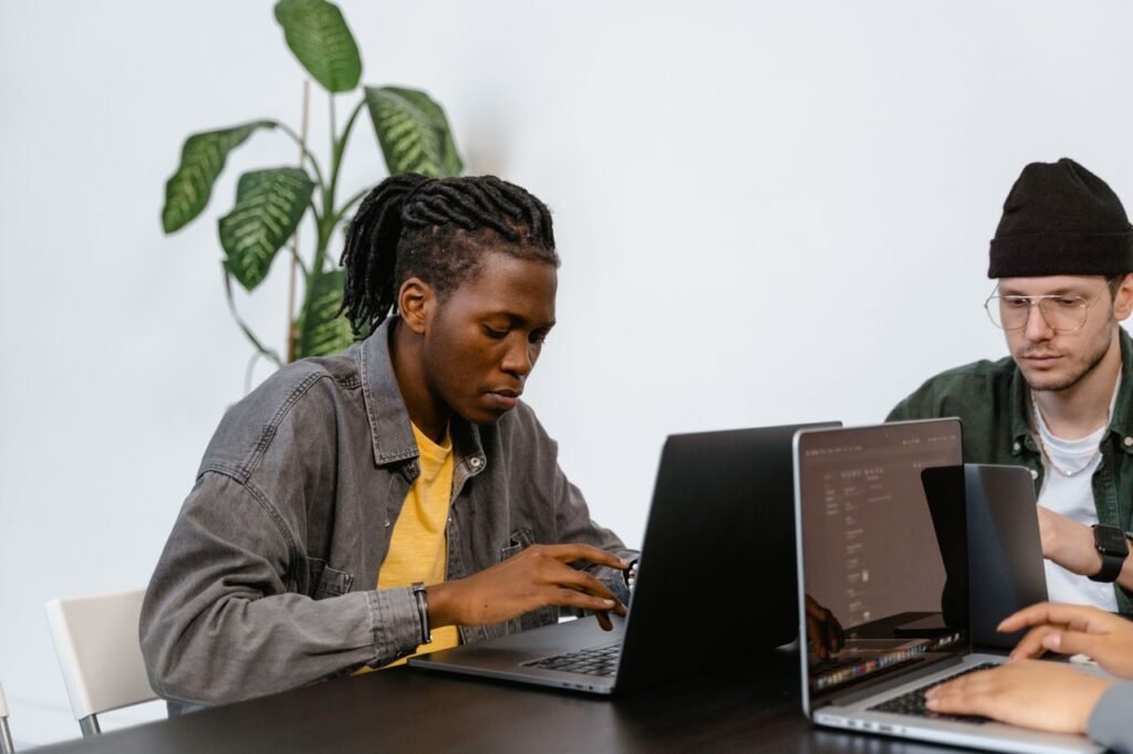 Students using laptops for education in 2026