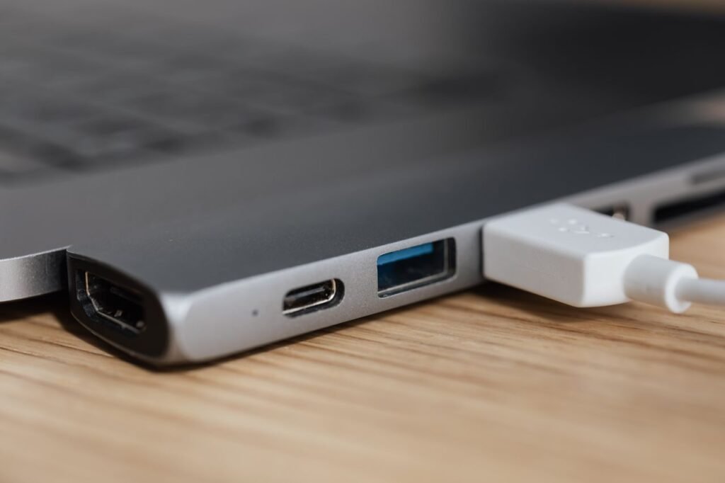 Comparison between old and modern laptop charger designs