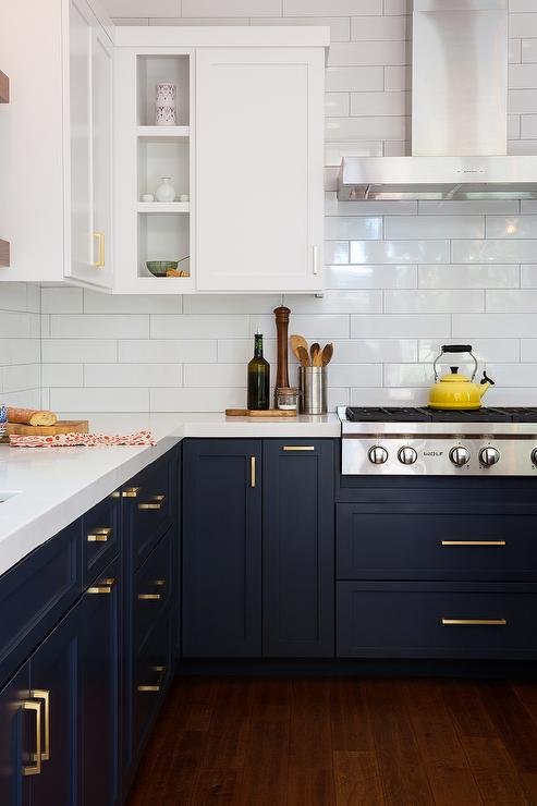 Popular Australian kitchen colour ideas including white, timber and navy blue.