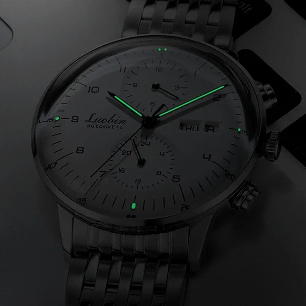 Automatic mechanical watch with luminous hands glowing at night