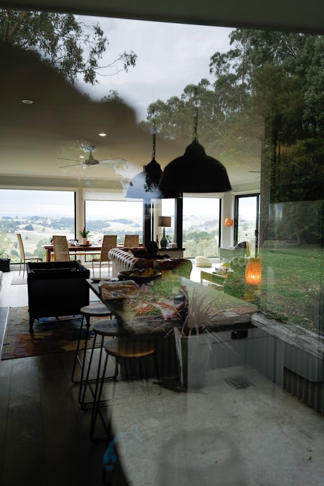 Open-plan Australian kitchen filled with natural sunlight.