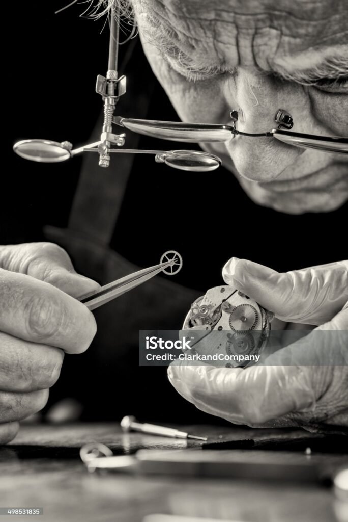 Swiss watchmaker assembling a luxury mechanical watch movement